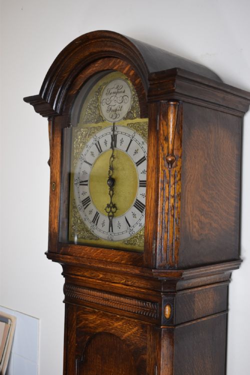 fig 1. Charming Mellow Sounding Triple Weight Musical Westminster Chiming Oak Grandmother or Grandfather Longcase Clock with Subtle Art Deco Decoration