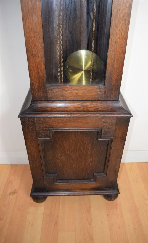 fig 1. Westminster Chiming Musical Grandmother or Small Grandfather Oak Longcase Clock with Glazed Trunk Door, Barley Twist Columns and Strike/Silent Dial