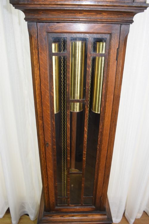 fig 1. Small Good Quality Quarter Chiming Musical Triple Tune Triple Weight Grandfather or Grandmother (74in) Oak Cased 8 Day Longcase Clock