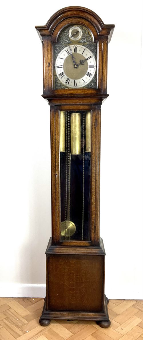 fig 1. Quarter Chiming Triple Musical Grandmother Longcase Clock 