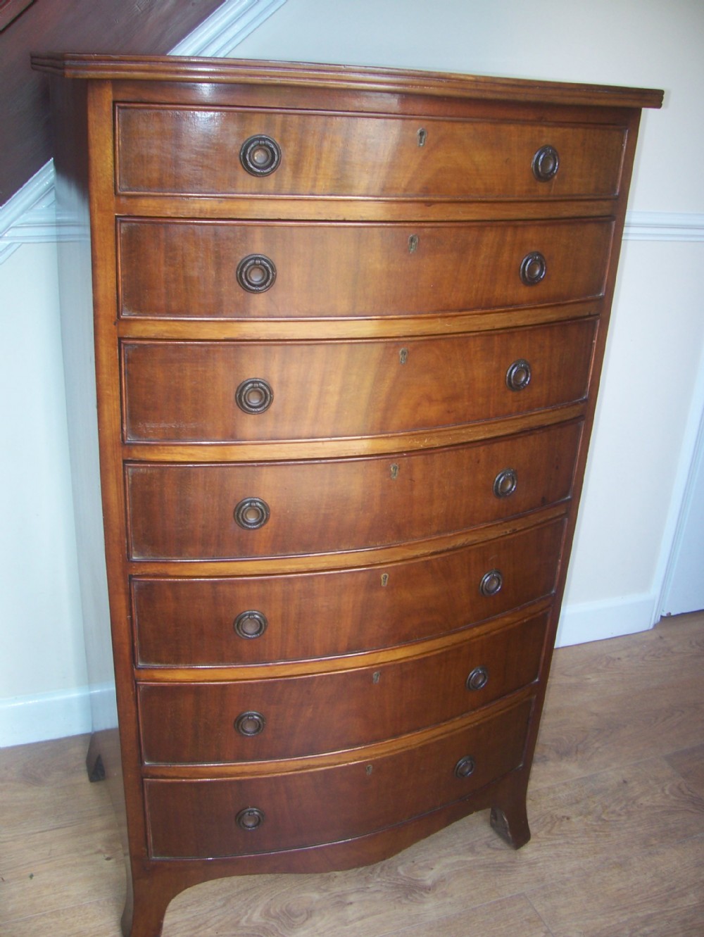 TALL BOW FRONT MAHOGANY CHEST OF DRAWERS