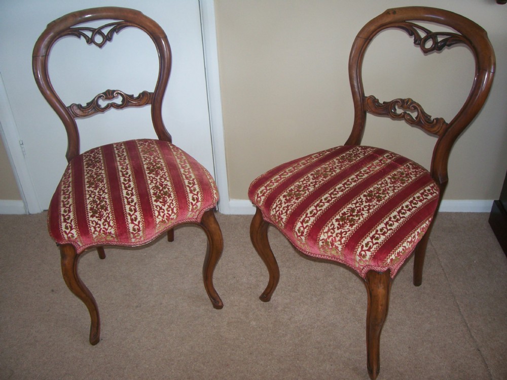 PAIR OF WALNUT BALLOON BACK CHAIRS