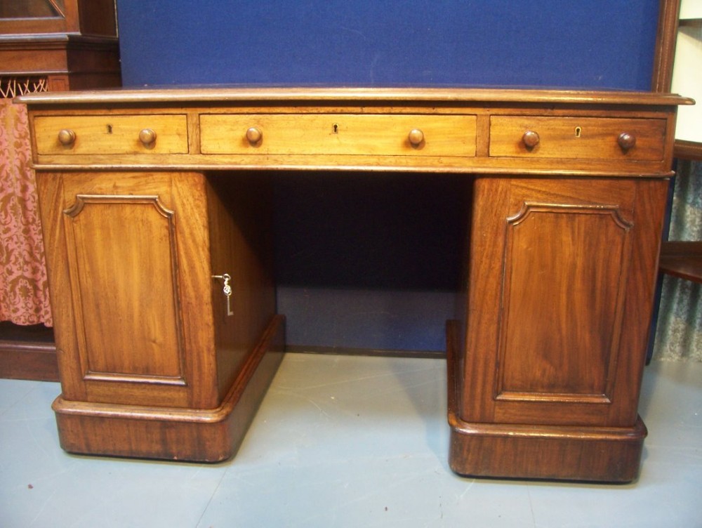 Victorian mahogany 9 drawer leather top twin pedestal desk