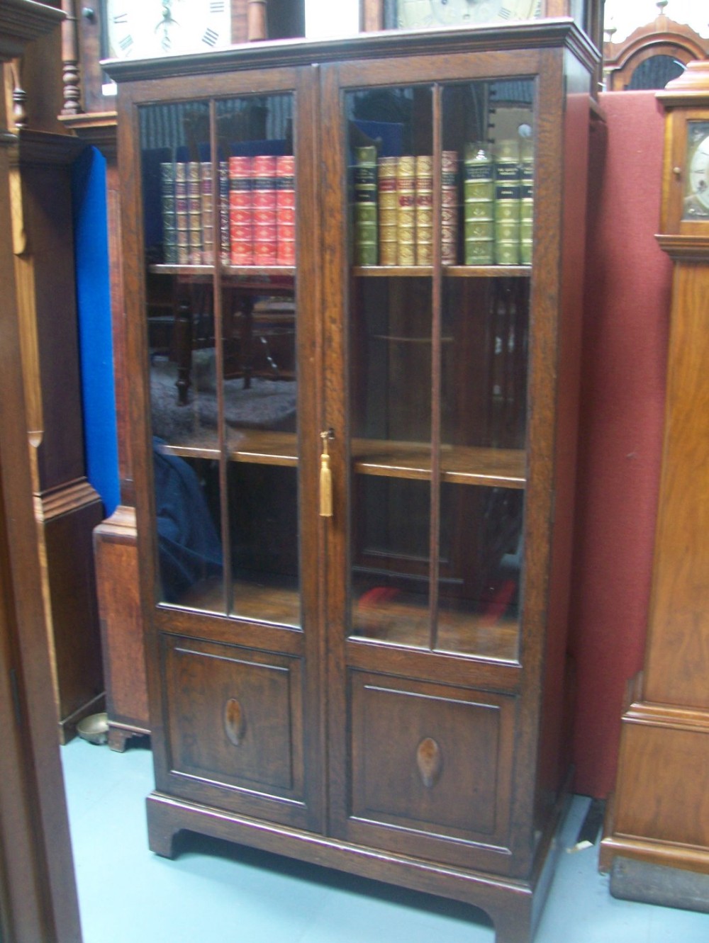 Oak glazed bookcase display cabinet c1920