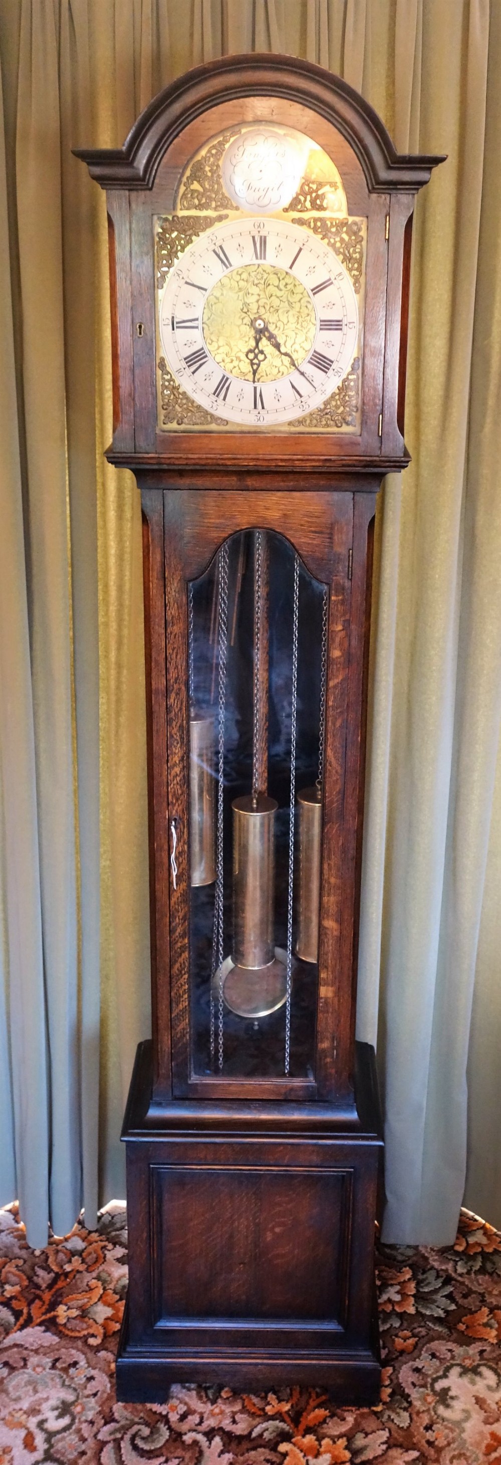 Glass Fronted Triple Weight Westminster Chiming Oak Cased Grandmother or Grandfather Longcase clock 