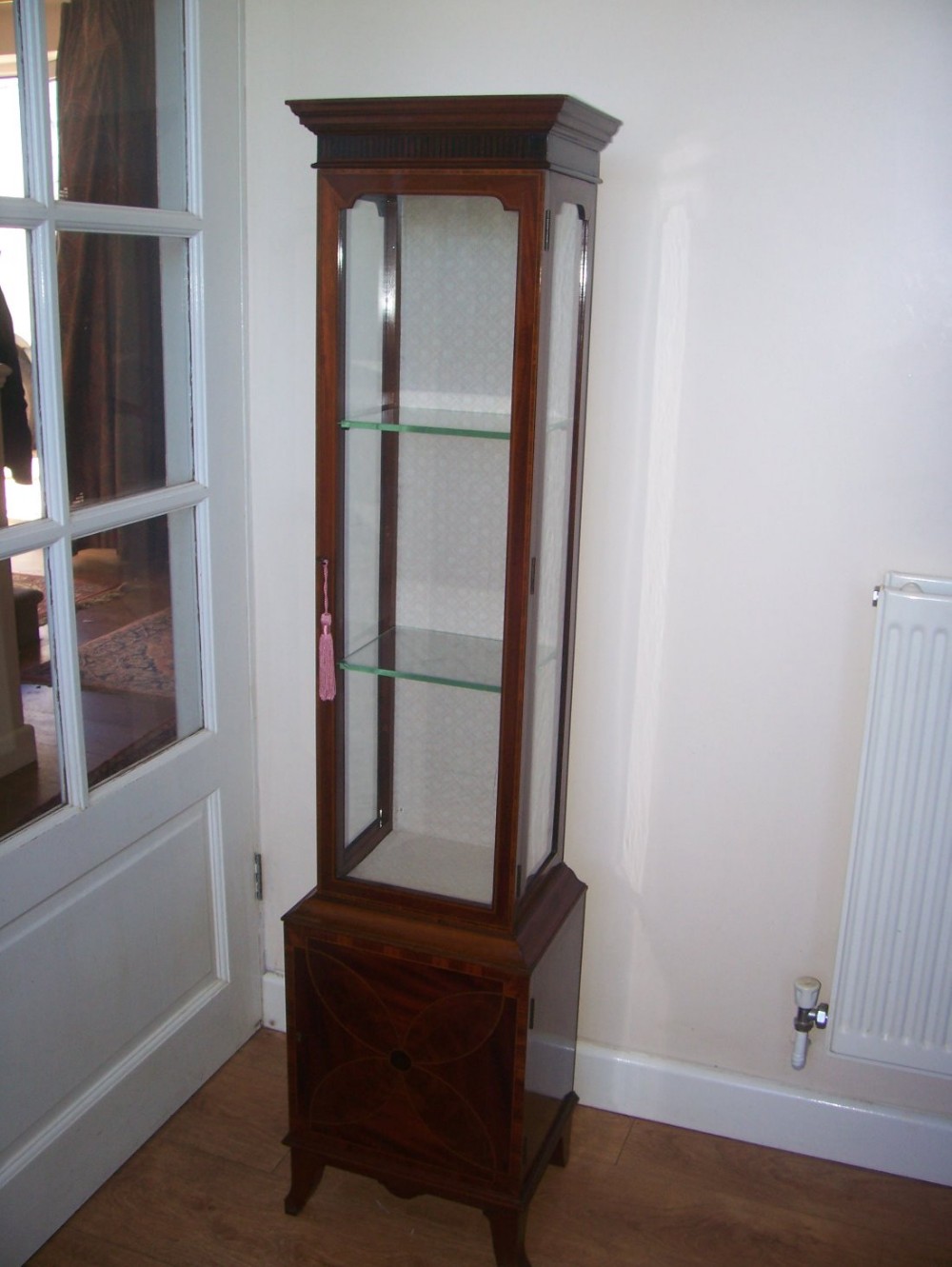 Narrow Inlaid mahogany pedestal display cabinet