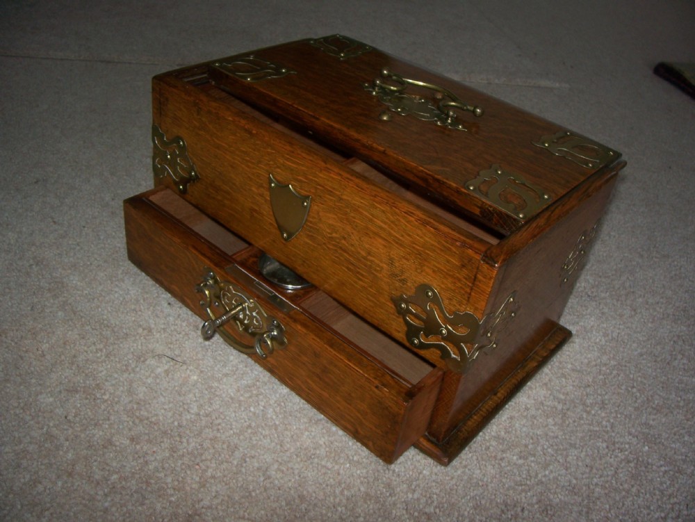 Victorian oak cigar box with brass mounts View V