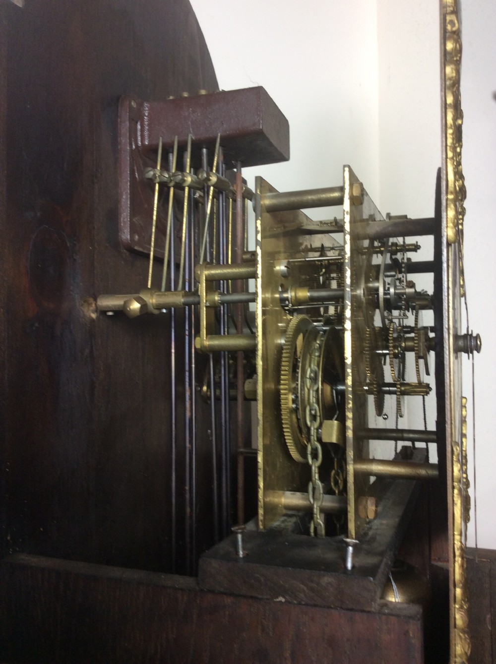 Triple Weight Westminster Chiming Oak Cased Grandmother or Grandfather Longcase Clock with Barley Twist Hood Columns View IV