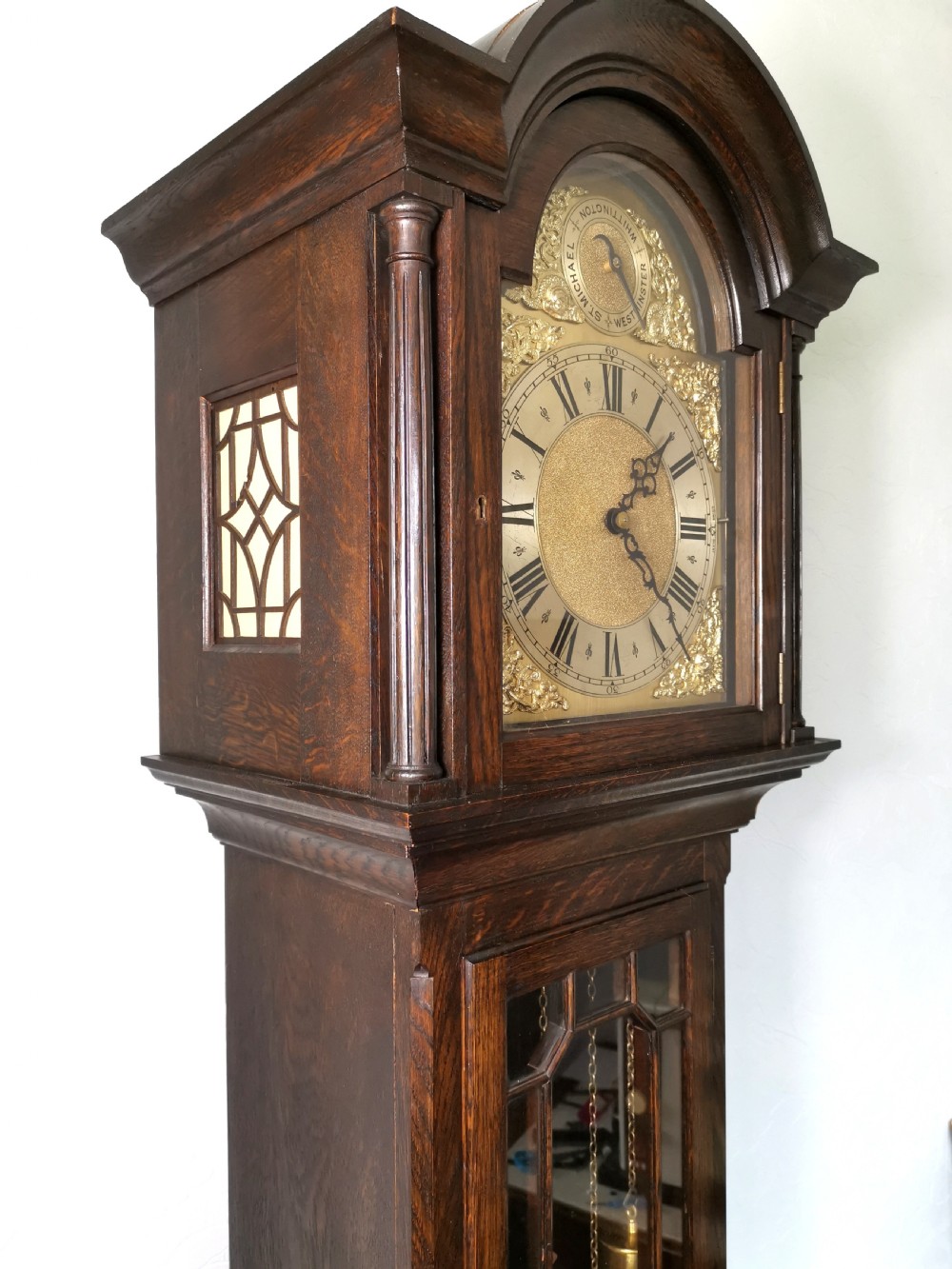 Early 20th C. Oak Triple Weight Triple Quarter Chiming & Hour Strike 8 Day Musical Grandfather Longcase Clock with Astragal Glazed Door View VI