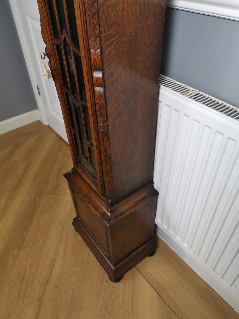 Quarter Chiming & Hour Striking English Dwarf Grandfather or Grandmother Musical Longcase Clock of Good Warm Oak & Astagal Glazed Trunk Door on Bun Feet.  View VII