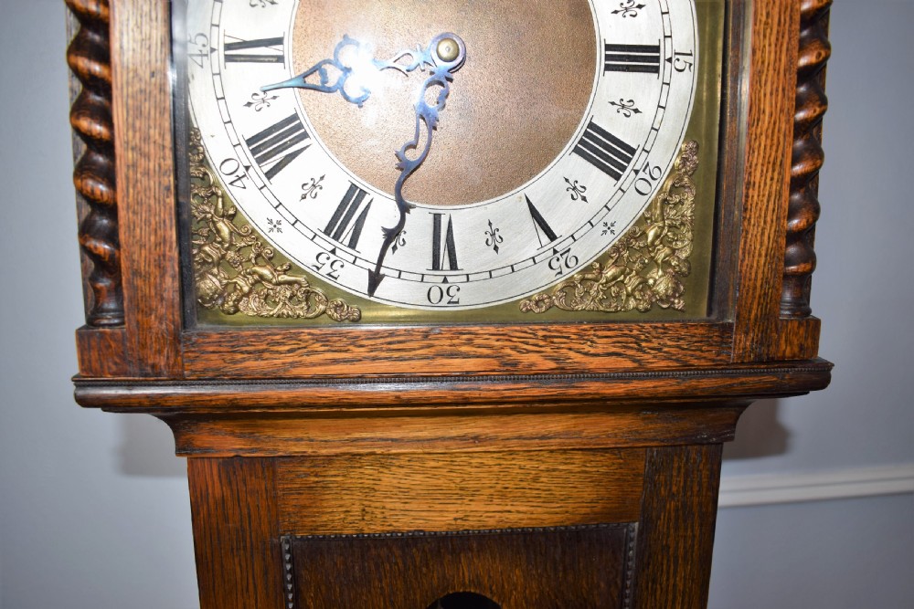 Charming 1920s Triple Weight Westminster Chiming Musical Grandfather or Grandmother Oak Longcase Clock with Barley Twist Hood Columns & Glass Door View III