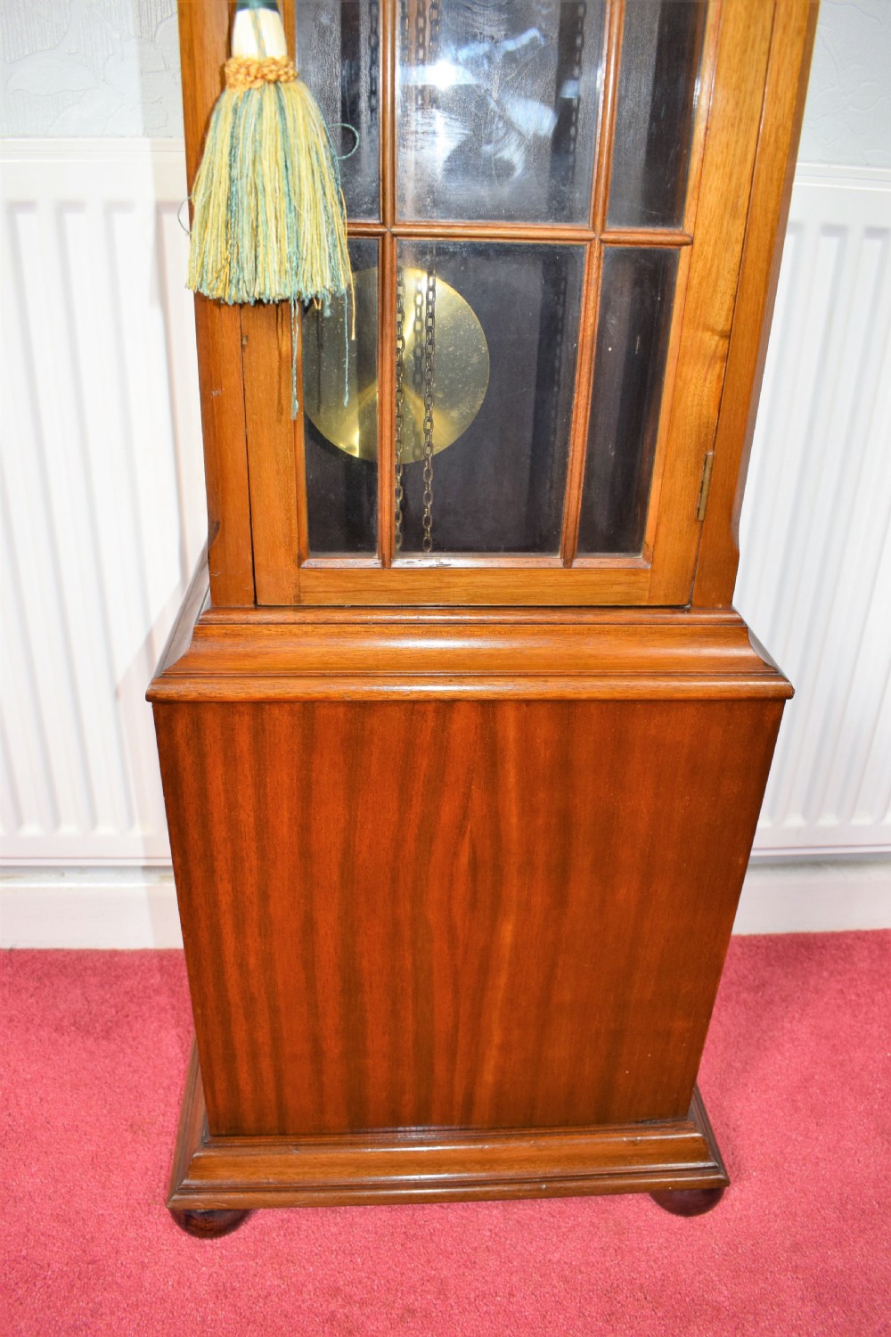 Triple Weight Walnut Westminster Chiming Musical Grandmother/Grandfather Longcase Clock with Astragal Glazed Trunk Door. View IV