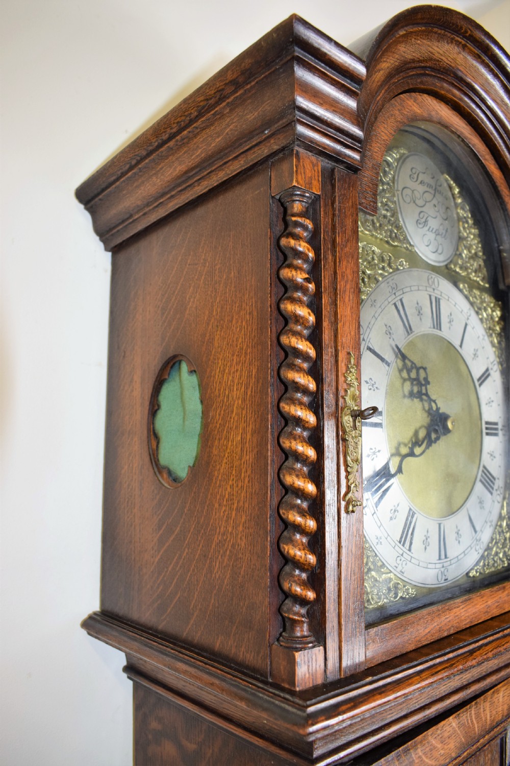 English Triple Weight Musical Chiming Grandmother or Grandfather Oak Longcase Clock with Barley Twist Columns Circa 1920 View II