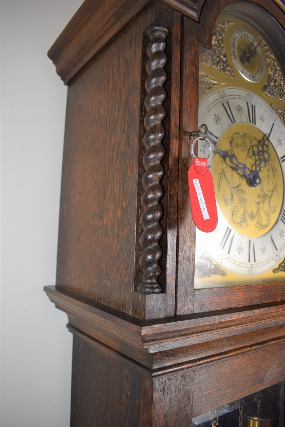 Westminster Chiming Musical Grandmother or Small Grandfather Oak Longcase Clock with Glazed Trunk Door, Barley Twist Columns and Strike/Silent Dial View III