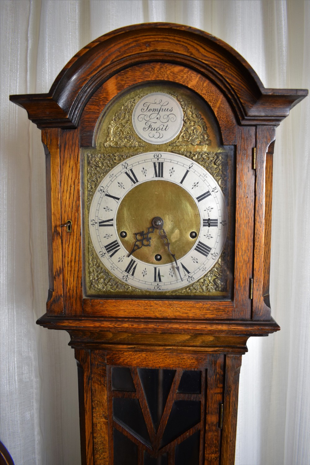 Small (65.5in) English Quarter Chiming Musical Light Oak Grandmother/Grandfather Longcase Clock with Astragal Glazed Long Trunk  Door Enfield Spring 8 Day Movement. View II