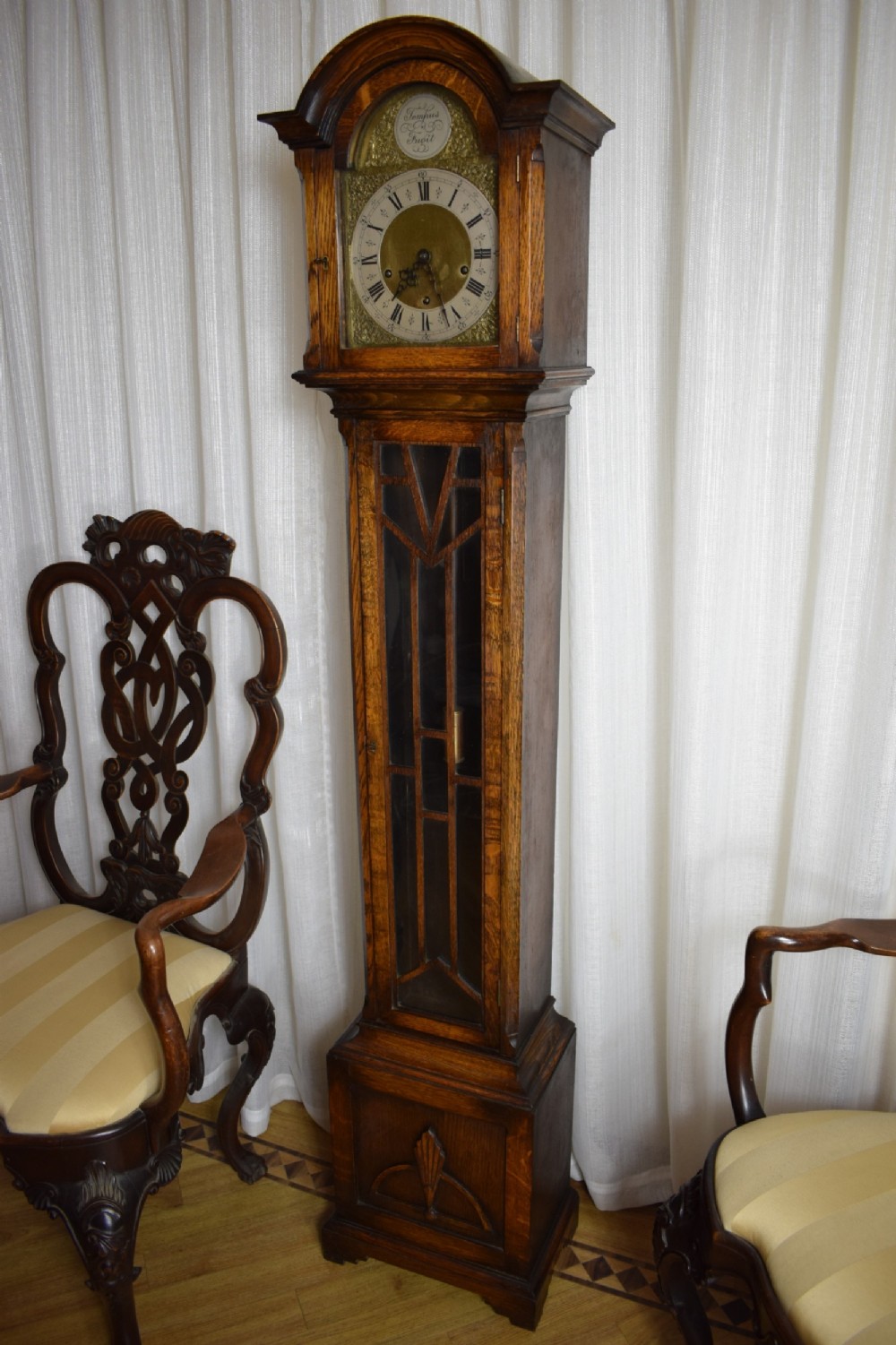 Small (65.5in) English Quarter Chiming Musical Light Oak Grandmother/Grandfather Longcase Clock with Astragal Glazed Long Trunk  Door Enfield Spring 8 Day Movement.