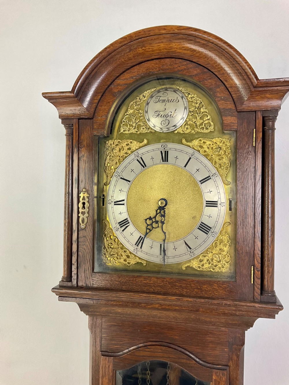 Small (70in) Musical Quarter Chiming Grandfather or Grandmother Oak Longcase Clock View II