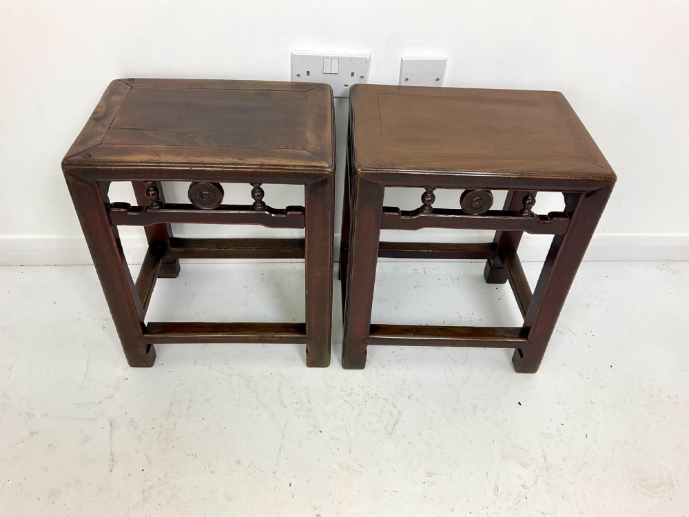A pair of dark hardwood rectangular Chinese occasional tables featuring carved aprons with central circular medallions and turned baluster supports. View XII