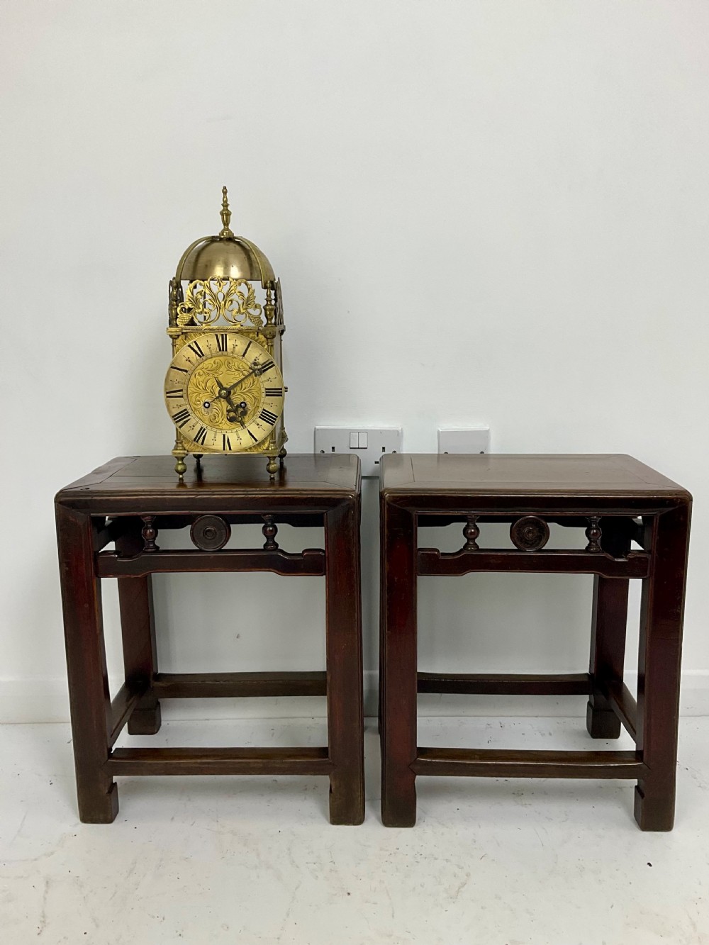 A pair of dark hardwood rectangular Chinese occasional tables featuring carved aprons with central circular medallions and turned baluster supports. View II