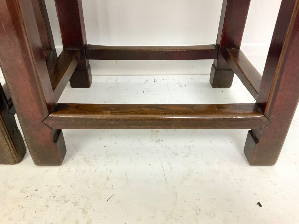 A pair of dark hardwood rectangular Chinese occasional tables featuring carved aprons with central circular medallions and turned baluster supports. View IV