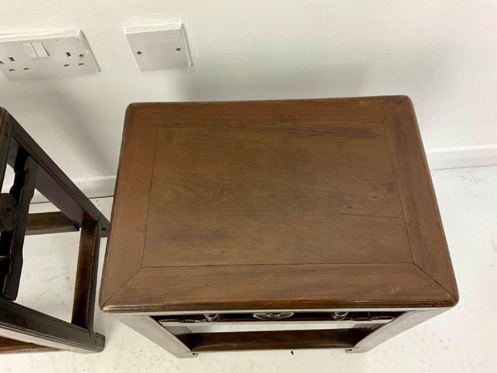 A pair of dark hardwood rectangular Chinese occasional tables featuring carved aprons with central circular medallions and turned baluster supports. View XI