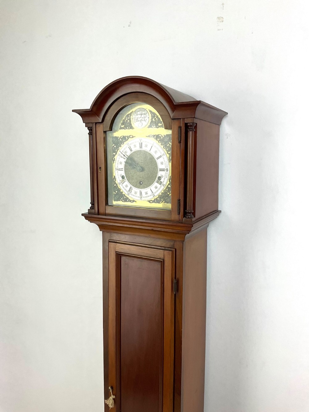 Petit Walnut Quarter Chiming Grandmother Longcase Clock