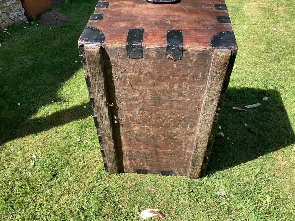 A 19th-century dark oak silver chest featuring black metal binding straps, corner plates, and central locking mechanism. View XII