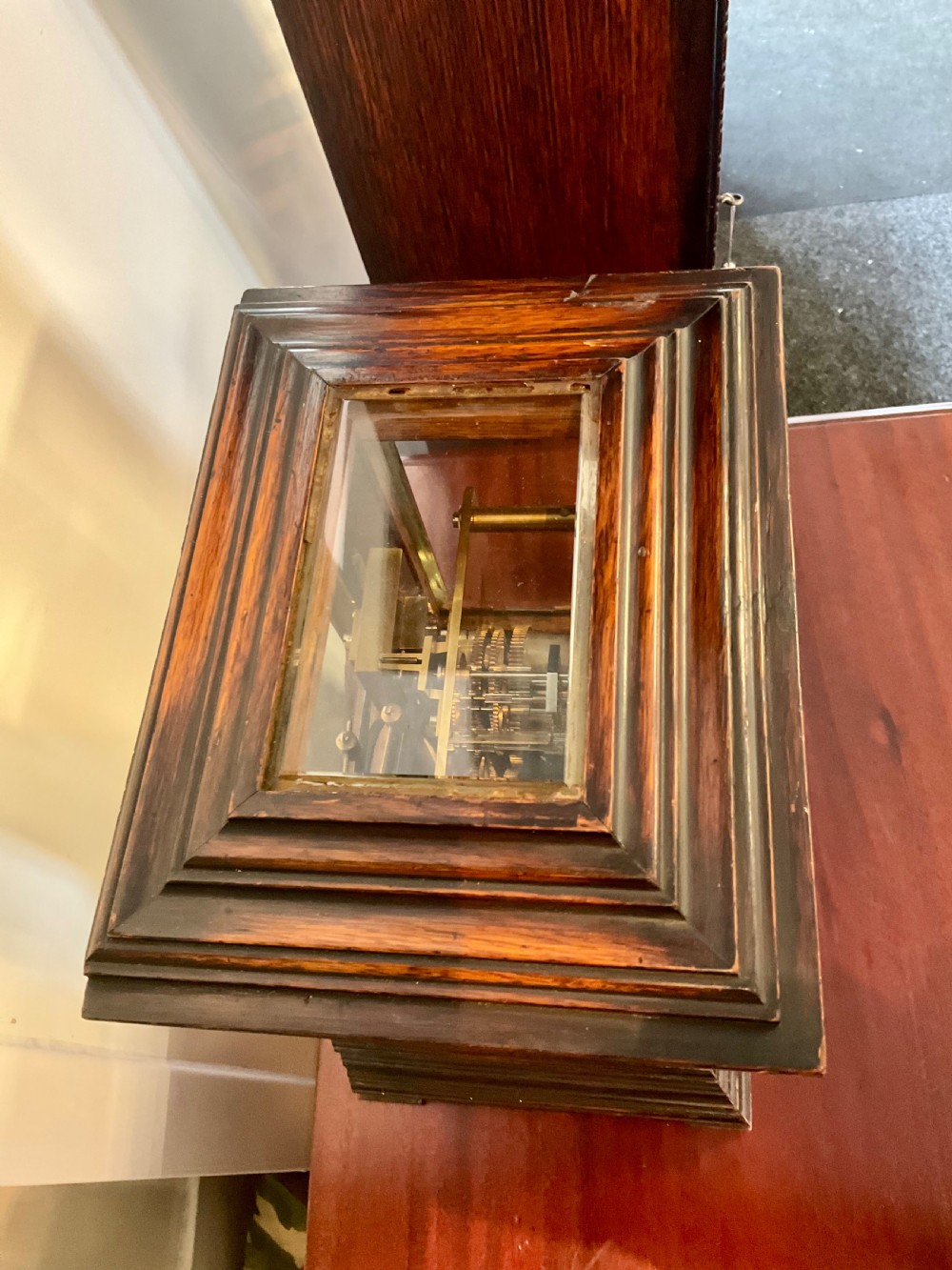 A Victorian dark mahogany five-glass bracket clock featuring a square white dial with Roman numerals and a stepped moulded base. View II