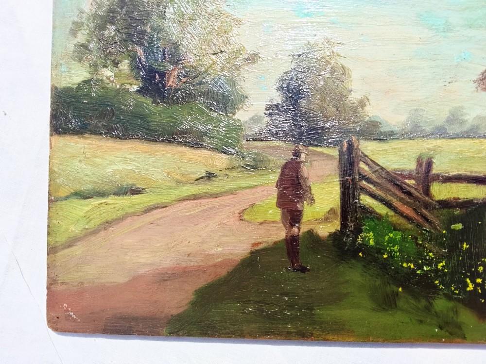 An antique English School oil painting on a wooden board depicting a rural landscape with a figure beside a dirt path, wooden fence, and timber barn under a light blue sky. View II