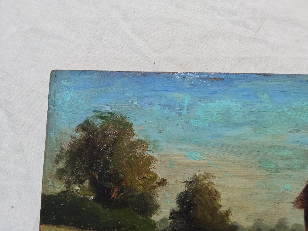 An antique English School oil painting on a wooden board depicting a rural landscape with a figure beside a dirt path, wooden fence, and timber barn under a light blue sky. View IV