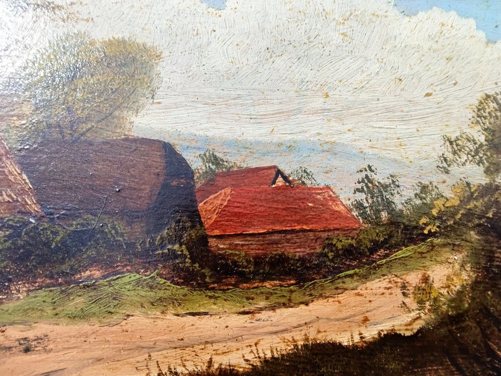 An antique oil painting on card depicting a rural English thatched cottage along a dirt path, set inside an ornate gilt frame. View IV