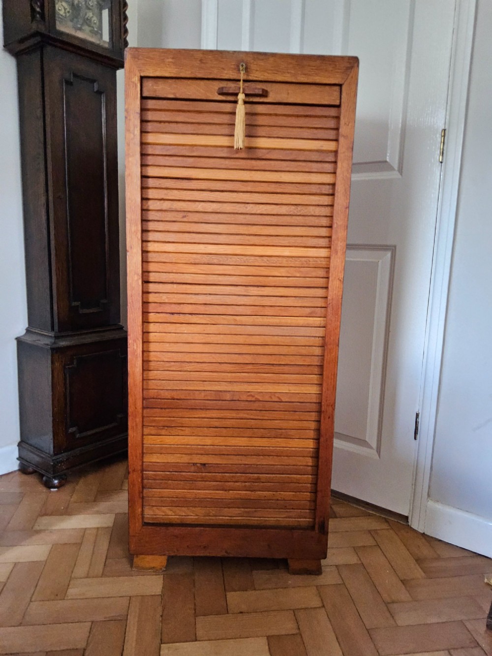 Oak tambour filing cabinet