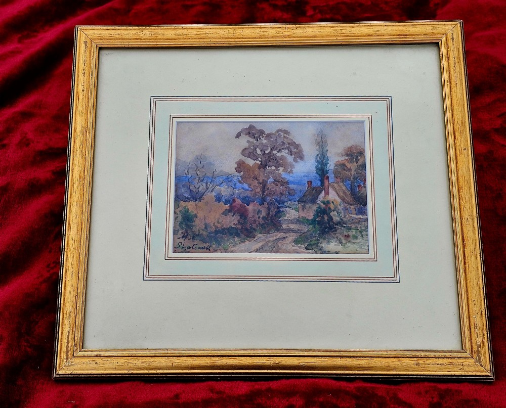 An early 20th-century impressionist watercolour painting depicting a rural country lane with trees and a cottage, framed with a layered mount. View V