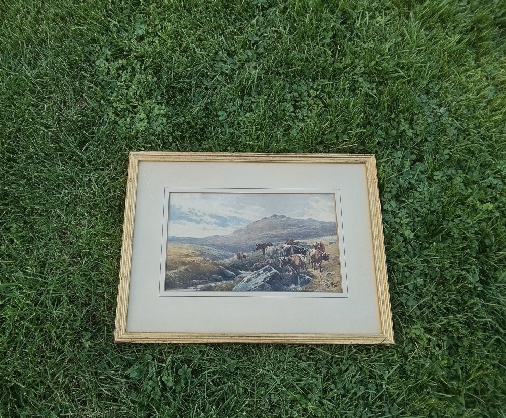 A framed horizontal watercolour painting depicting cattle and sheep grazing in a rugged moorland landscape under a cloudy sky. View VI