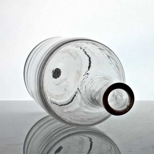 fig 1. A clear lead glass Georgian shoulder carafe featuring a flared neck and five horizontal raised Lynn rings around the lower body.