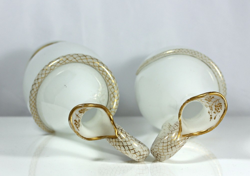 Pair of Richardsons of Stourbridge white opaline, mouth-blown, snake-handled glass ewers View III