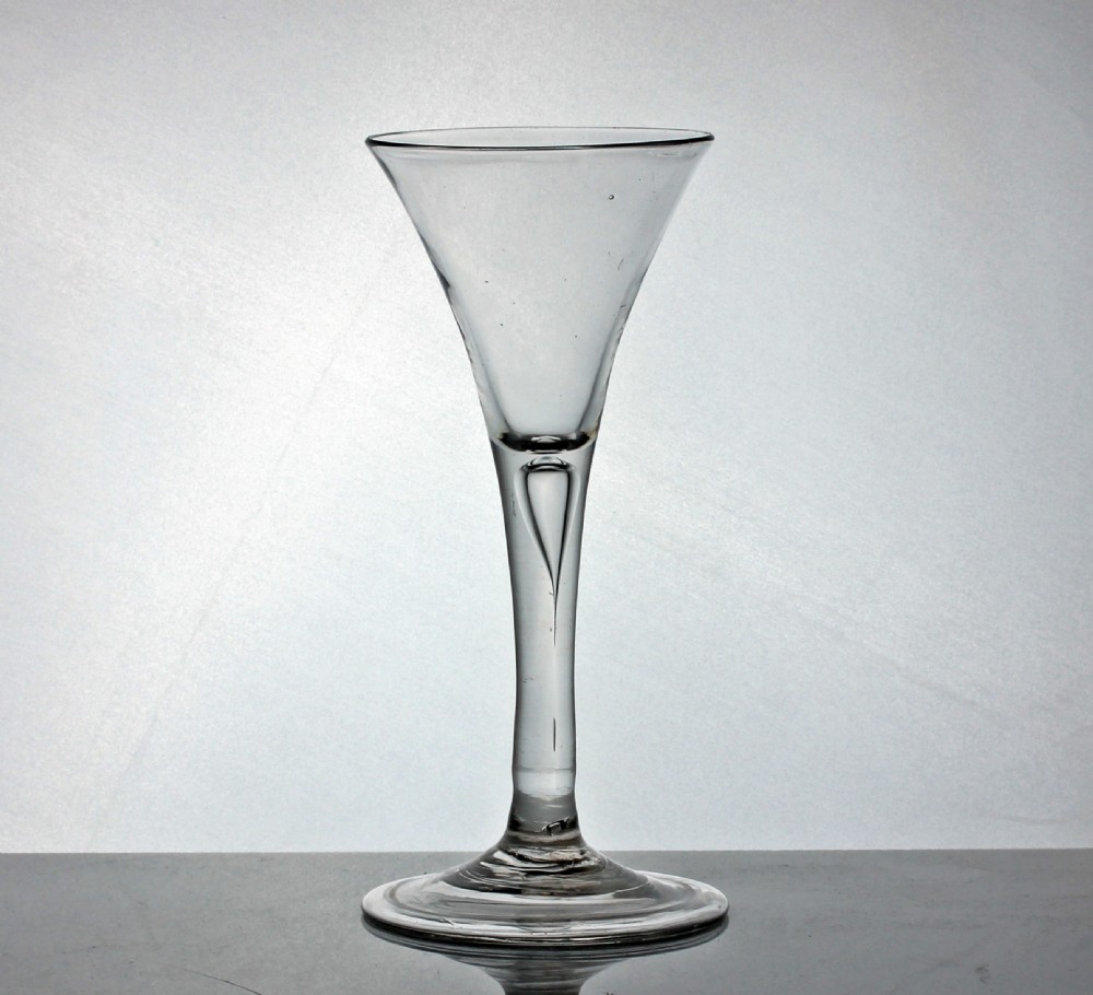 Georgian plain stem wine glass, trumpet bowl, folded foot, air tear