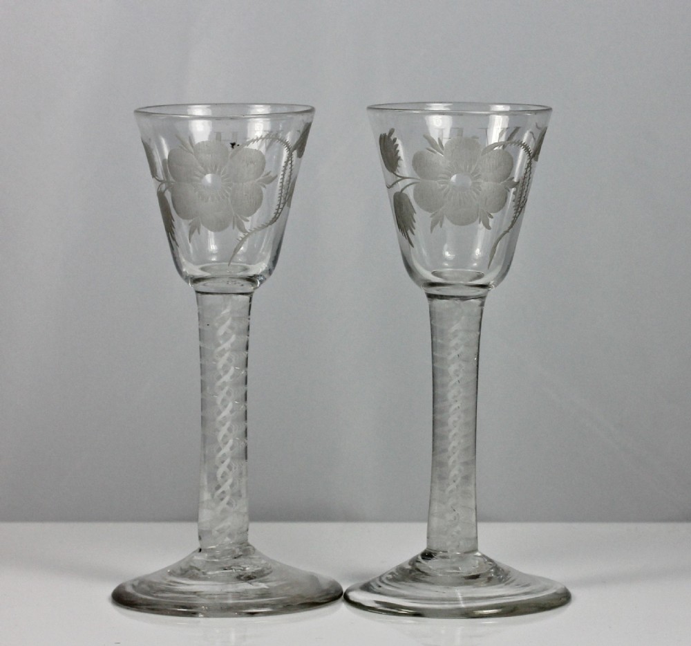 Georgian pair of Jacobite engraved double series opaque twist wine glasses View II