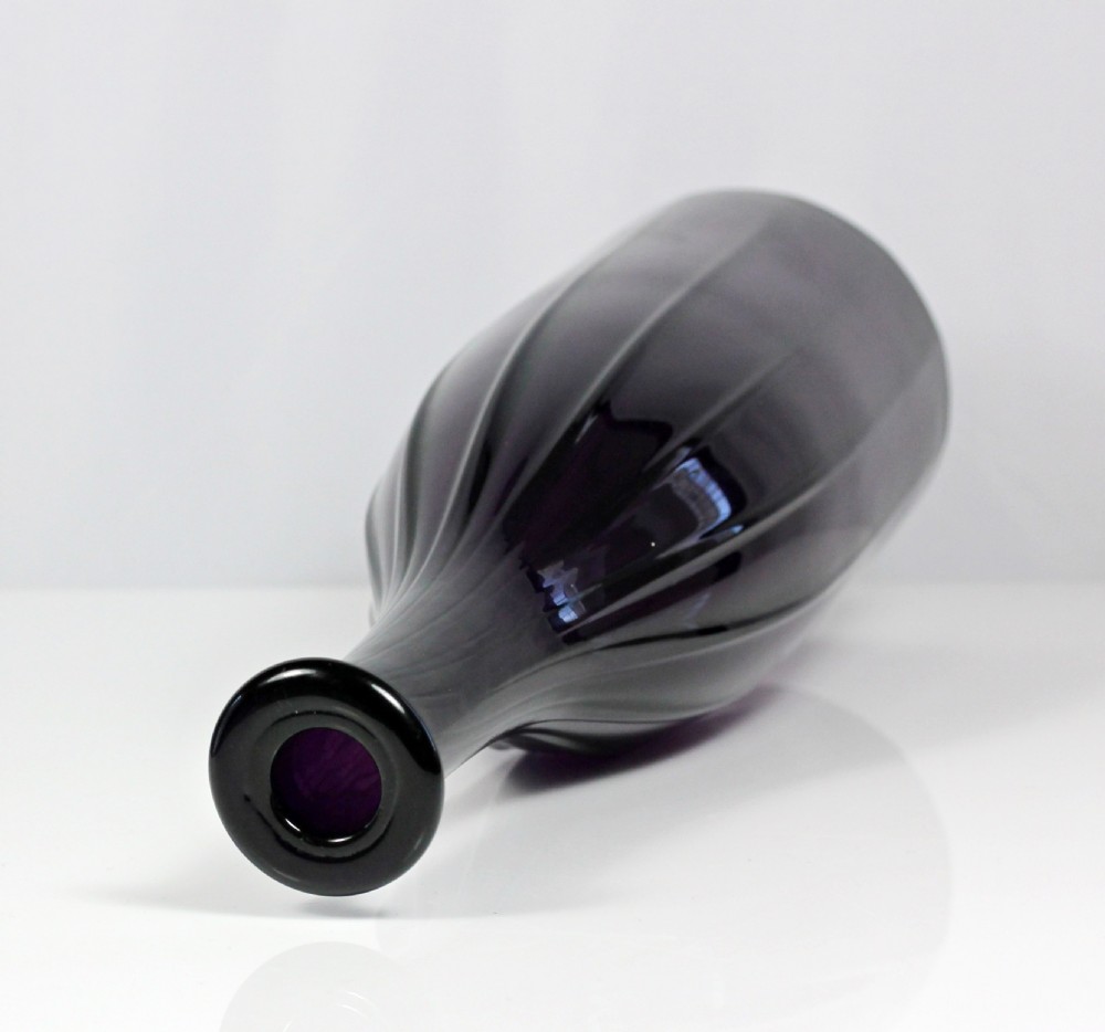 George IV, mouth-blown rib-moulded glass spirit bottle, amethyst View IV