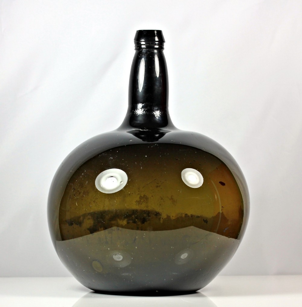 Late Georgian dark green large onion-shaped apothecary bottle View II