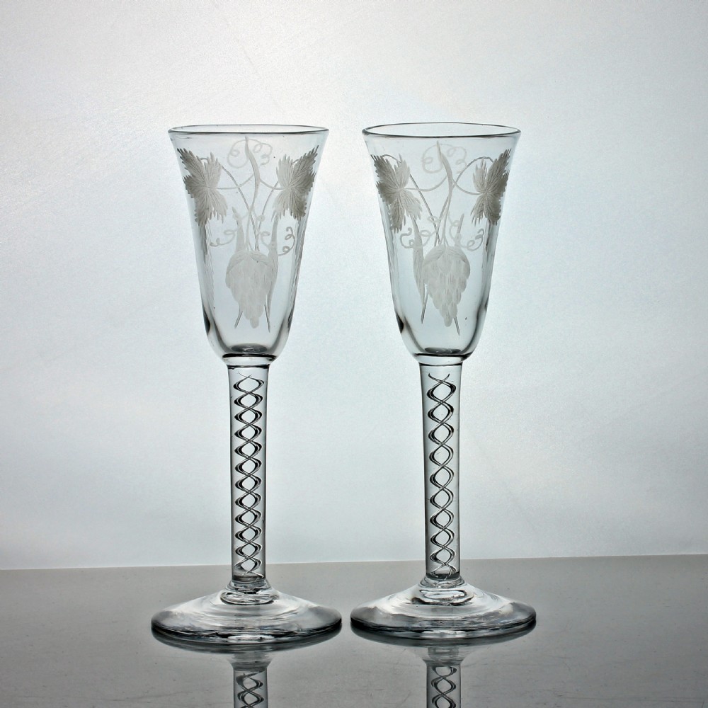 Georgian pair of hop & barley engraved single series air twist ale glasses