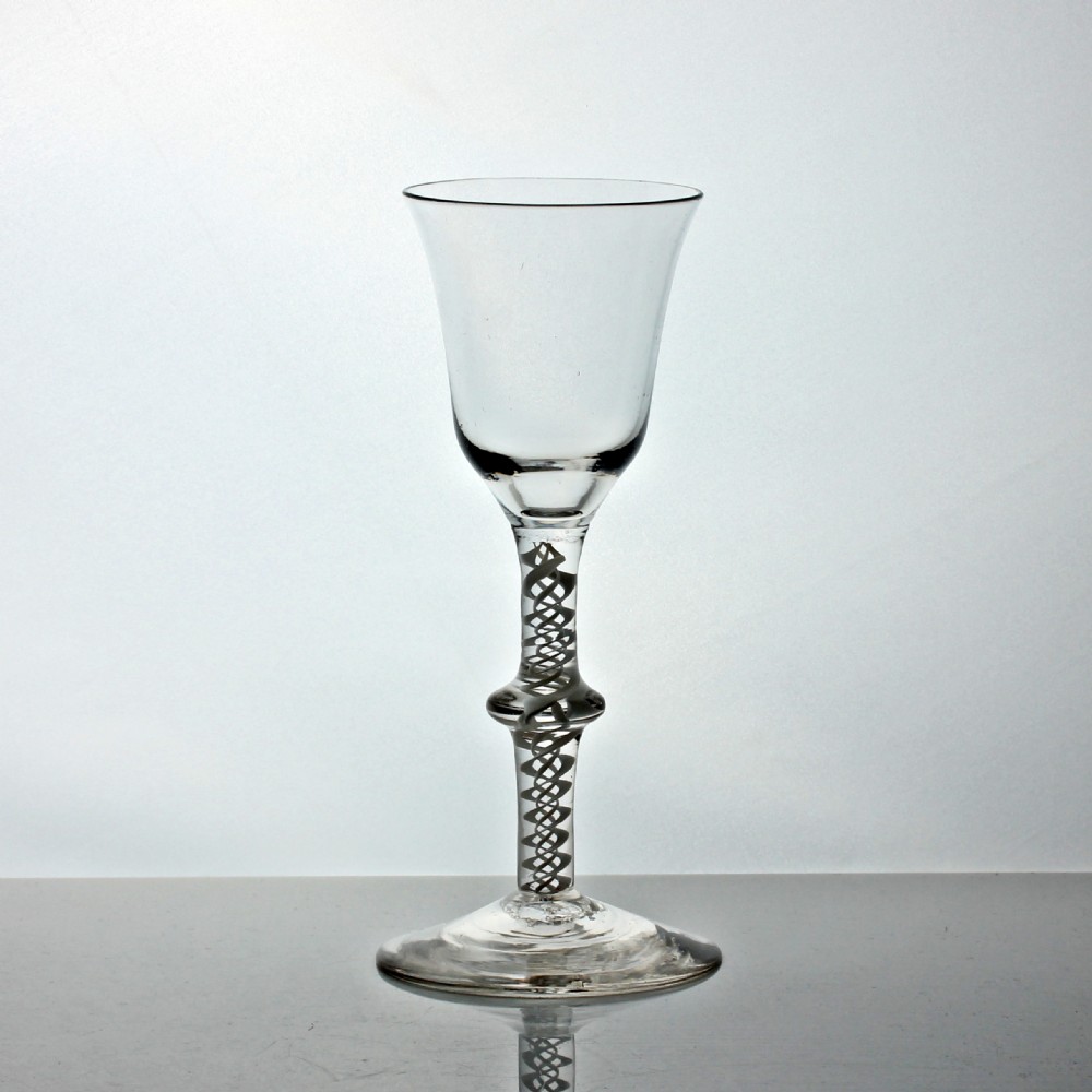Georgian double series opaque twist stem wine glass, medial knop, everted bowl rim