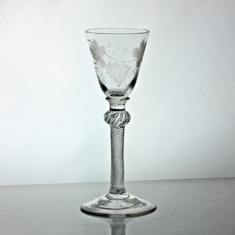 Georgian multi spiral air twist wine glass, vine-engraved rounded funnel bowl