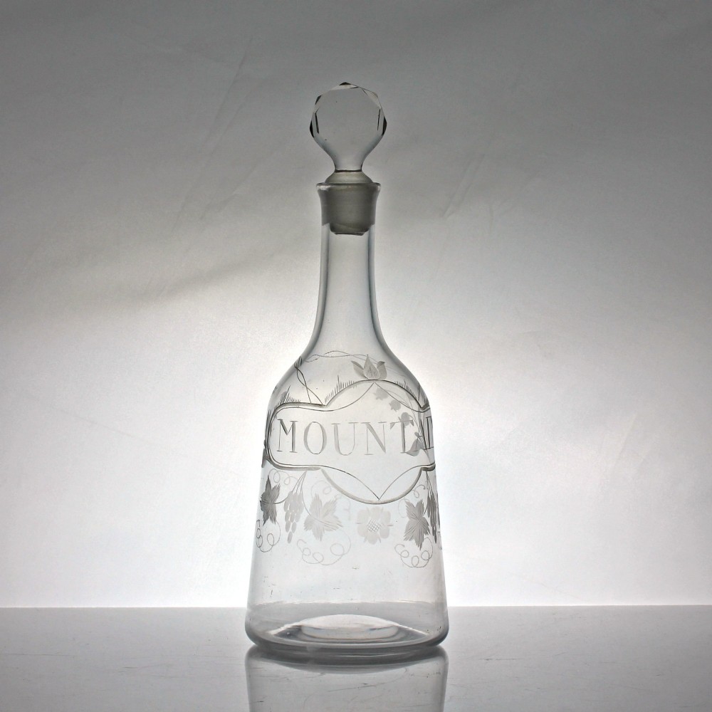 Georgian sugarloaf decanter with engraved faux label for 