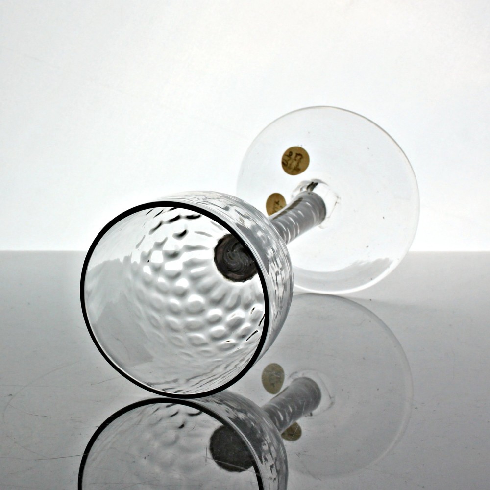 An 18th-century Georgian clear glass goblet featuring an ovoid bowl with basal mouldings, a double series opaque twist stem, and a flat conical foot. View III