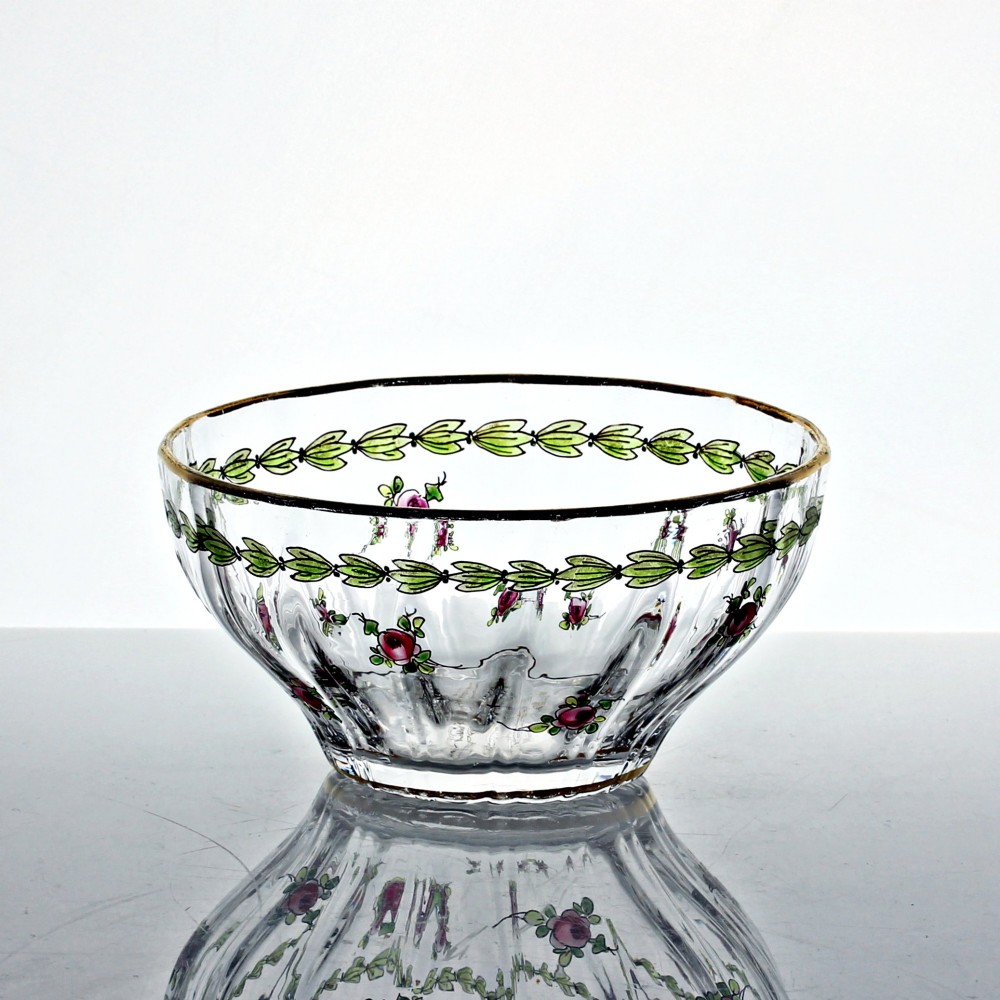 A set of four clear glass finger bowls decorated with hand-painted green leaf garlands, pink floral motifs, and gilded rims. View II