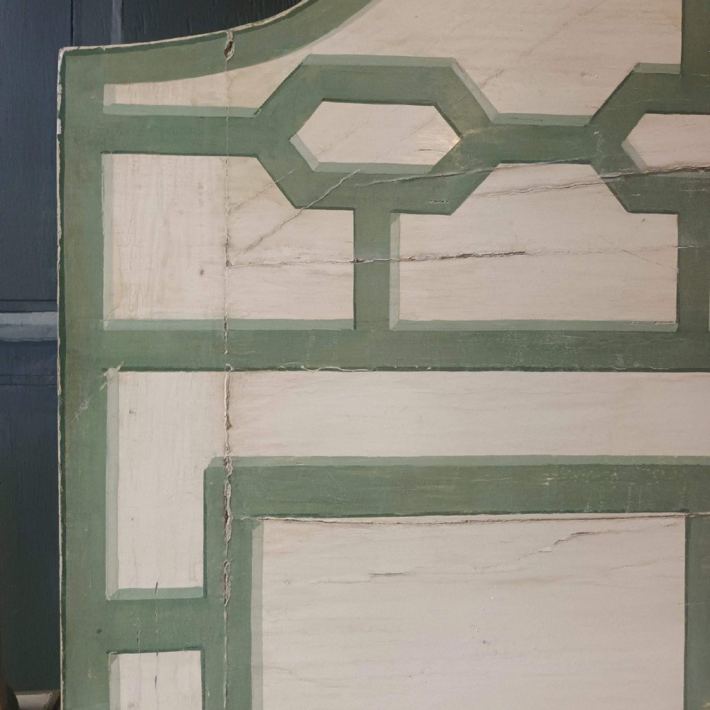 A cream-painted Edwardian four-poster bed frame featuring a pagoda-shaped headboard, decorative geometric fretwork, urn finials, and a painted canopy underside. View VIII
