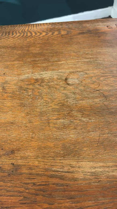 fig 1. A square dark oak window table featuring distinct turned legs with central bulbous knops and a lower perimeter box stretcher.