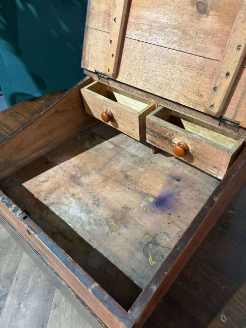 fig 6. A Victorian pine tabletop clerks desk with a sloped hinged lid, keyhole, and a carved gallery edge across the top.