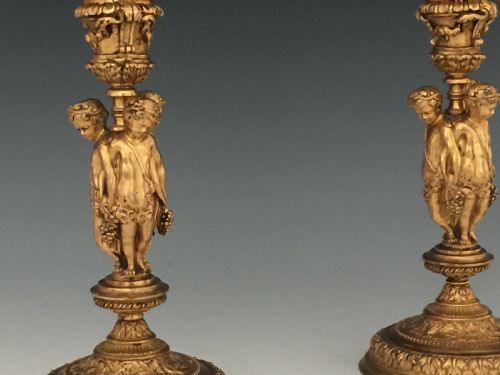 ANTIQUE PAIR OF GILT BRONZE CHERUB CANDLESTICKS - ADDITIONAL PHOTO 1